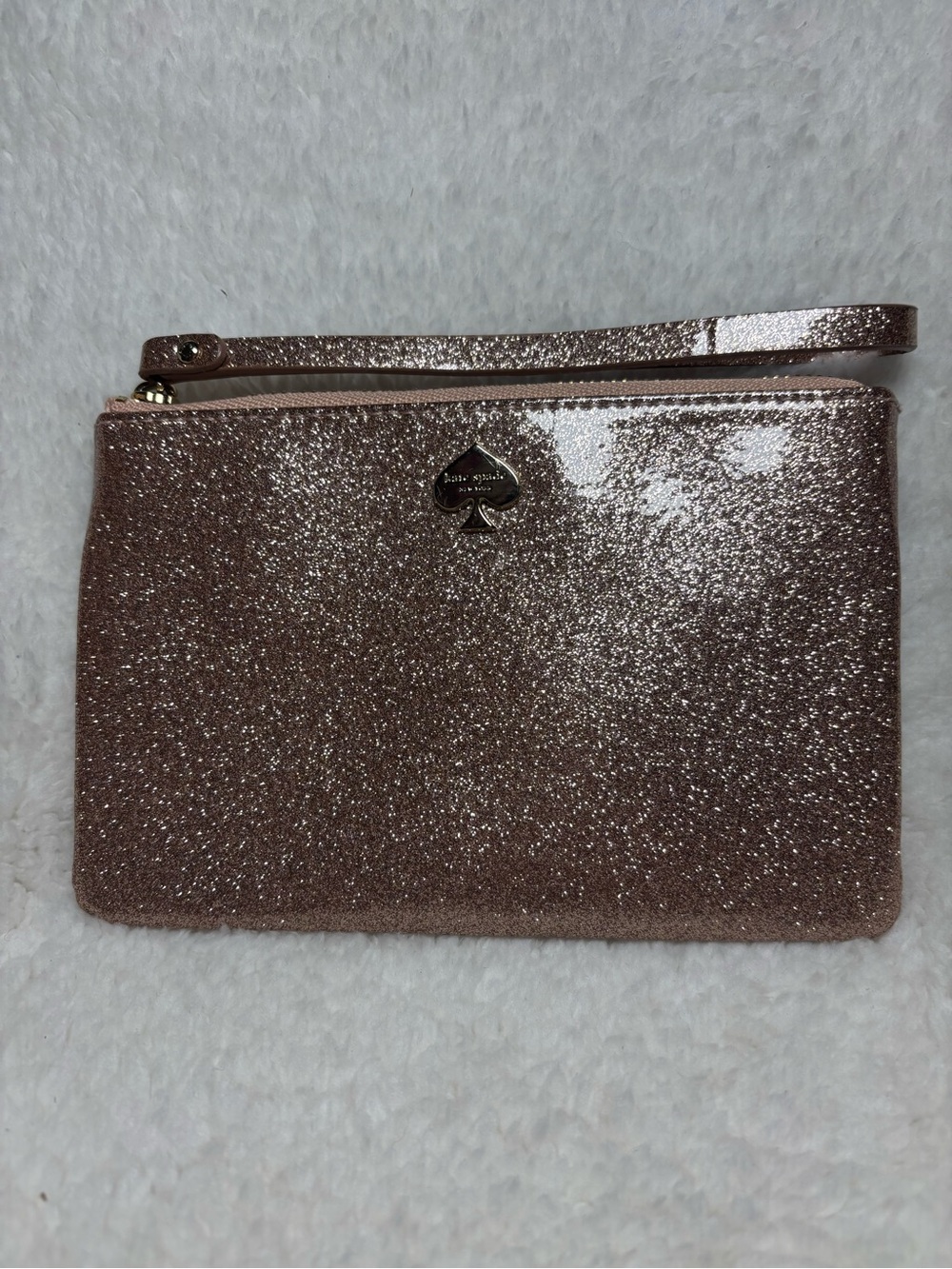 kate spade metallic glitter wristlet in rose gold shimmer